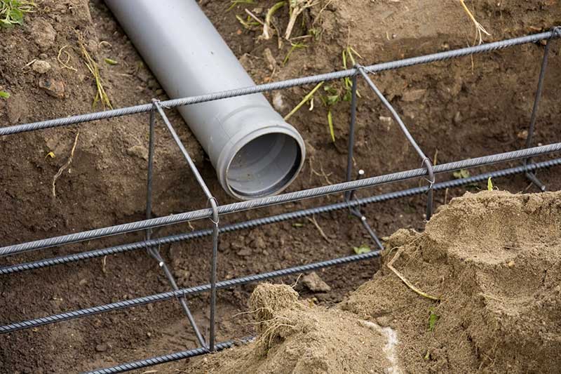 poser tuyaux drainage sol